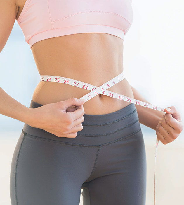 femme minceur mesure ventre plat